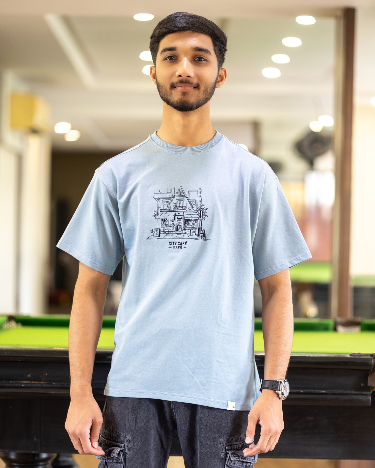 CITY CAFÉ – 'Sip Into Style' Unisex T-shirt