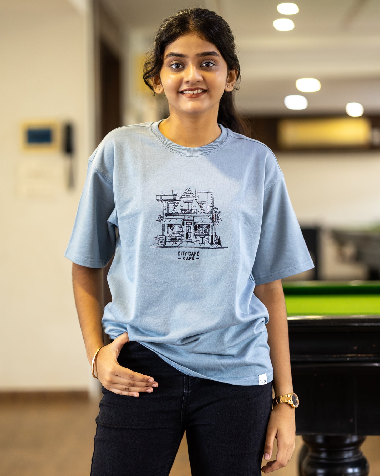 CITY CAFÉ – 'Sip Into Style' Unisex T-shirt